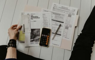 Regulation A+ investing guide showing diverse investors reviewing financial documents in a modern office