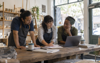 Local business owners review expansion records before considering investment crowdfunding